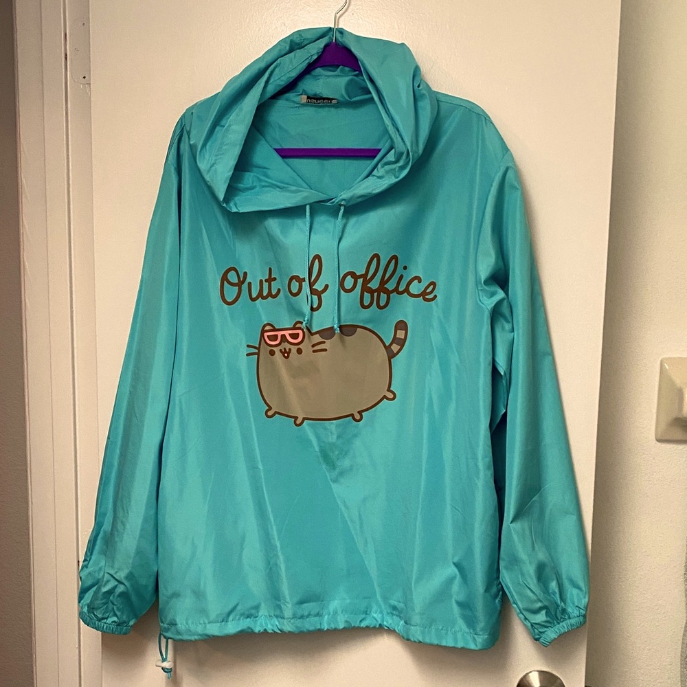 Pusheenbox Exclusive “Out of Office” Rain jacket with drawstrings.